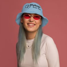 Make a stylish and eco-friendly choice with the organic bucket hat! This 100% cotton twill hat has the potential to become a favorite in your wardrobe thanks to its breathable material and clean look. Embroidered Bucket Hat, Be Kind To Yourself, Beetlejuice, Slate Blue, Hat Making, Haiti, Trucker Cap, Ghana, Cotton Twill