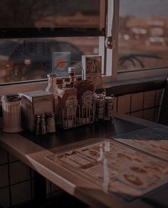 some food is sitting on a table near a window