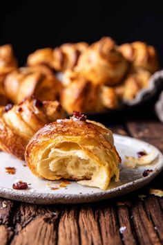 a pastry is on a plate with other pastries in the backgroung