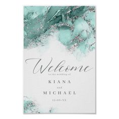 the welcome card is shown in teal and white marble with silver glitters on it