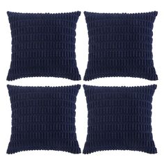 four dark blue pillows on a white background