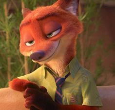 the fox is wearing a green shirt and tie