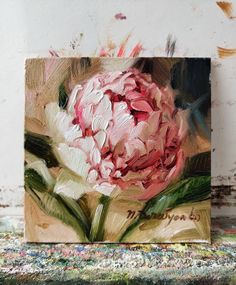 an acrylic painting of a pink flower