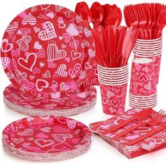 a table setting with red paper plates and cups, utensils and napkins