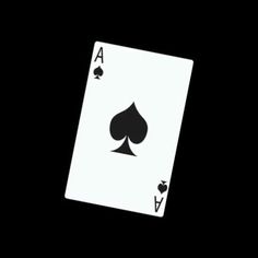 a black and white ace playing card in the dark