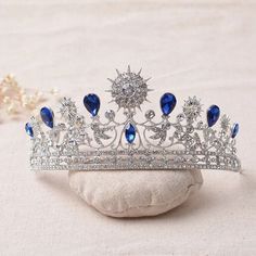 This stunning tiara is crafted from tarnish resistant zinc alloy and intricately decorated with crystals to create an elegant look ideal for any special occasion, including weddings, quinceañeras, birthdays, pageants and more. Delight the Queen of your world and tell them they're your one and only! 🤩 **WEARING YOUR CROWN OR TIARA** Loops are featured in the design for securing to hair with bobby pins or clips **SHIPPING** All orders are sent within 24 hours from Florida, USA. They are sent without an invoice which is ideal for gifting. Please include a gift message at time of purchase in the note box or send a message through the inbox. Arrival time is usually 3-5 business days with first class. For faster shipping, choose priority. Quinceanera Tiaras, Tiara Headband, Silver Tiara, Beautiful Tiaras, Royal Tiaras, Gold Tiara, Tiara Hairstyles, Rhinestone Tiara, Princess Tiara