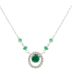 Everyday Emerald and Diamond Necklace with Chain in 18K Gold studded with round cut emerald and round cut diamonds. This stunning piece of jewelry instantly elevates a casual look or dressy outfit. Emerald enhances intellectual capacity of the person. Designed with a round cut emerald set in center with halo of diamond, and emerald beads in between the chain making a stunning delicate necklace. This is a perfect Unique Gift, Bridal Shower Gift, Secret Santa Gift, Gift For Sister, Mother Daughter Gift, Bride To Be Gift, Bridesmaid Gift, Thanksgiving Gift, Christmas Gift or any Holiday Gift for Mother, Sister, Daughter, Grandma, Fiancé, Girlfriend, Valentine, Family or Friend on your list.  PRODUCT DETAILS :-  Material - 18K Solid White Gold Gemstone - Emerald Gemstone Weight - 1.63 cts Gems Formal Round Emerald Necklaces, Elegant Green Emerald Necklace With Brilliant Cut, Dazzling Round Emerald Necklace, Elegant Green Diamond Pendant Necklace, Fine Jewelry Emerald Necklaces With Diamond Accents, Green Round Gemstone Diamond Necklace, Formal Round Emerald Necklace Fine Jewelry, Formal Round Emerald Necklace, Emerald Necklace In Brilliant Cut