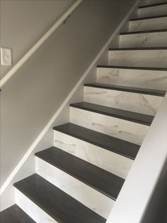 a set of stairs leading up to the second floor