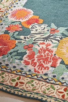 Bright blooms are framed in an intricate, vivid pattern, making this rug the perfect statement piece for a bedroom, entryway, or living room. Not sure which rug to choose? [Read our guide ](https://www.anthropologie.com/stories-home-area-rug-placement) to find the perfect fit for your space. | Hand-Tufted Gitta Rug by Anthropologie, Size: 2 X 3, Cotton/Wool/Rayon Colourful Rug Living Room, Colorful Living Room Rug, Best Rugs For Living Room, Green Floral Rug, Colorful Rugs Living Room, Floral Rugs Living Room, Jewel Tone Bedroom, Anthropologie Rug, Area Rug Placement