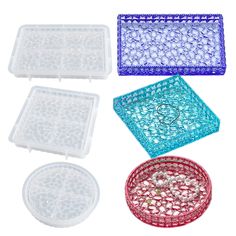 four plastic trays with different designs on them