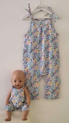 Custom made Dolly & Me matching rompers Available in sizes: - 1Y - 2Y - 3Y - 4Y - 5Y - 6Y - 7Y - 8Y Dolls romper available in sizes 13", 15" and 18" - please clarify when ordering which size you need Made from 100% cotton fabric Regular wash, line or tumble dry. Blue Bubble Romper For Summer Playdate, Cute Multicolor Jumpsuits And Rompers For Playtime, Cute Summer Jumpsuits And Rompers For Playtime, Summer Cotton Overalls For Playdate, Playful Jumpsuits And Rompers For Summer Playtime, Multicolor Jumpsuits And Rompers For Summer Playwear, Summer Playwear Overalls Jumpsuits And Rompers, Summer Playwear Overalls, Summer Playwear Overalls And Rompers