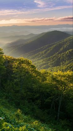 the sun shines brightly in the mountains