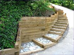 landscape timber timbers retaining wall steps wood 6x6 ties treated stairs railroad spikes walls using garden edging landscaping lumber raised Landscape Timber Edging, Cheap Retaining Wall, Sleeper Retaining Wall, Wood Retaining Wall, Retaining Wall Design, Timber Stair, Railroad Ties