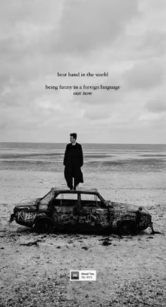 a man standing on top of an old car in the middle of the ocean with a quote above it