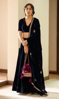 Overall Navy blue velvet Lehenga skirt Blouse Blouse Piece : Stitched Lehenga & Blouse is free size: Adjustable upto 28 to 44 inches Lehenga Length: 43 inches long (Length & Chest have 1 n 1.5 inches +/-) Color: navy blue Fabric: Soft  silk velvet Lehenga & Blouse Work: Plain work  Care : DryClean Note: Visual Samples on website may differ slightly from actual product due to light & effects during photography NOTE : Before placing order ,pls confirm product n color availability on +91 7903893945 & +91 8447750028(WhatsApp) NOTE : For Wholesale Order MOQ is 5 Pieces of any color/Pattern contact on +91 7903893945 & +91 8447750028(WhatsApp) Picture is for reference purpose Velvet Lehenga Blouse, Blue Velvet Lehenga, Navy Blue Lehenga, Lehenga With Blouse, Velvet Suit Design, Long Blouse Designs, Velvet Lehenga, Lehenga Designs Simple, Velvet Dress Designs