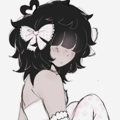 a girl with black hair and a bow in her hair