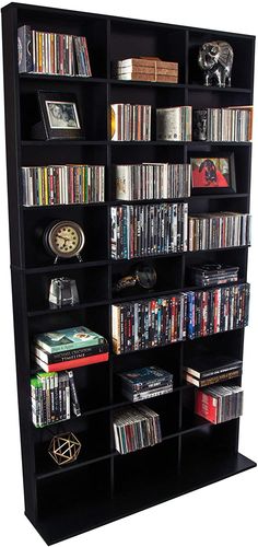 a black book shelf filled with lots of movies