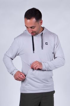 Made with the same recycled material as our tees, our Core Traverse Tek Hoodies are designed to compliment every outfit. With performance characteristics and a soft hand feel, they are built for every adventure and designed for your everyday. Functional Gym Hoodie With Kangaroo Pocket, Urban Activewear With Adjustable Hood, Functional Gray Hoodie With Kangaroo Pocket, Functional Hoodie With Ribbed Cuffs For Outdoors, Functional Hoodie For Outdoor Activities With Ribbed Cuffs, Hoodie With Kangaroo Pocket, Athleisure Hoodie With Kangaroo Pocket For Outdoors, Athleisure Hoodie With Kangaroo Pocket For Outdoor Activities, Functional Moisture-wicking Cotton Hoodie