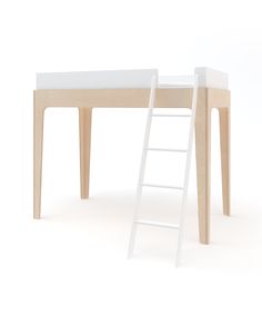 a white ladder leaning up against a wooden desk