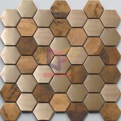 a wall made up of wooden hexagonal tiles