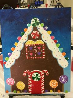 a painting of a gingerbread house with candy canes