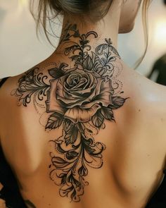 a woman with a tattoo on her back