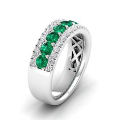 This exquisite emerald and diamond wedding band is a stunning symbol of eternal love and commitment. Crafted with precision and care, the band features alternating emerald and diamond stones set in a delicate and elegant design. The vibrant green emeralds are complemented by the sparkling diamonds, creating a beautiful contrast that will surely captivate anyone's attention. Metal: 14K Gold Setting Type: Prong Rhodium Finish: Yes, on White Gold Gemstone Details: Gemstone: Emerald Shape: Round Ave Green Diamond Half Eternity Round Cut Ring, Green Diamond Half Eternity Ring For Anniversary, Green Diamond Ring For Anniversary With Half Eternity Band, Green Emerald Ring Half Eternity Round Cut, Green Emerald Half Eternity Ring Round Cut, Diamond Half Eternity Emerald Ring For May Birthstone, Green Emerald Ring With Pave Setting For Anniversary, Green Emerald Wedding Ring With Pave Setting, Formal Green Diamond Ring With Half Eternity