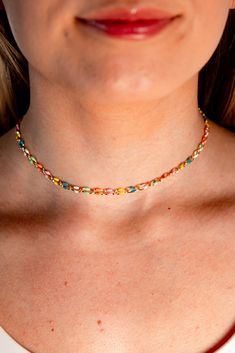 Add a pop of color to your outfit with the Paulina choker necklace. Made of stainless steel with gold plating, it features vibrant enamel links and an adjustable length for a perfect fit. Stand out from the crowd in style! Water resistant! Trendy Adjustable Chain Choker Necklace, Trendy Colorful Necklace With Adjustable Chain, Trendy Choker With Adjustable Chain, Colorful Jewelry With Adjustable Chain, Multicolor Clavicle Chain Choker As Gift, Trendy Multicolor Metal Chain Necklace, Trendy Multicolor Choker For Gift, Multicolor Chain Choker Jewelry, Trendy Multicolor Necklace With Adjustable Chain