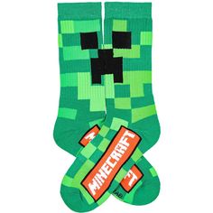 Minecraft merchandise. Do you love to play Minecraft? If you do, you need to get these socks to add to your collection. These green great thick socks feature an all-over cubed Creeper design. Made of 98% Polyester, 2% Spandex. These are awesome socks that will keep your feet warm and comfy all day long. Playful Green Socks For Gifts, Playful Green Socks For Stocking Stuffers, Minecraft Merchandise, Awesome Socks, Play Minecraft, How To Play Minecraft, Shipt Shopper, Thick Socks, Cool Socks