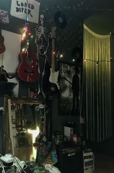 a room filled with guitars and other musical instruments