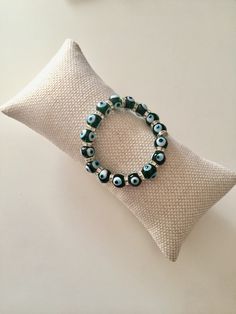 Glass Evil Eye Beaded Bracelet, Nazar Bracelet, Green Evil Eye, Turkish Bracelet #jewelry #bracelet #evileye #minimalistbracelet #evileyebracelet #nazarbracelet #turkisheyebracelet #turkishbracelet #matibracelet #greekeyebracelet #greekbracelet #glassevileyebracelet #glassevileye #greenevileye #turkishjewelry Adjustable Beaded Green Evil Eye Bracelet, Green Evil Eye Bracelet With Round Beads As Gift, Green Evil Eye Bracelet With Round Beads, Green Beaded Evil Eye Bracelet Gift, Green Beaded Bracelets With Evil Eye For Gift, Green Beaded Evil Eye Bracelet For Gifts, Green Evil Eye Round Bead Jewelry, Green Evil Eye Round Beads Jewelry, Green Evil Eye Jewelry With Round Beads