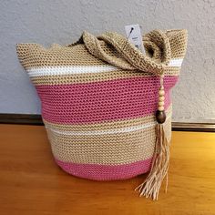 Cute Medium Sized Hand Bag. Overall Color Is Beige W/ Wide Pink Stripes And Narrow White Stripes. Soft To The Touch With Cute Wooden Beads On Attached Tassel. Roomy With 1 Inside Zip Pocket And 2 Slip Pockets. Pictured Filled With Bubble Wrap For Structure. Snap Close. Brand New With Tag From My Smoke Free Home. Pink Crochet Bucket Bag With Adjustable Strap, Pink Bucket Crochet Bag For Travel, Pink Crochet Beach Bag For Everyday Use, Pink Crochet Bucket Bag For Travel, Pink Crochet Bucket Bag, Crochet Bucket Shopping Bag, Slouchy Hobo Bag, Scarf Hanger, Slouch Bags