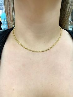 14k Diamond Cut beaded layering chain. Perfectly worn Alone or with a pendant. Also gorgeous as a choker/ stackable necklace. Material: Genuine 14k solid gold.Length: 16 inch. (Available in other lengths, weight will vary slightly on length chosen.)Width: Approximately 2.2mm wide. Weight: Approximately 8.5 grams. Comes in a nice box. Yellow Gold Necklaces With Tiny Beads For Everyday, Yellow Gold Double Strand Beaded Necklace, Yellow Gold Choker Necklace With Satellite Chain, Dainty Yellow Gold Single Strand Beaded Necklace, Yellow Gold Beaded Necklaces With Tiny Beads, Yellow Gold Beaded Necklaces With Delicate Chain, Yellow Gold Beaded Necklace With Tiny Beads, Gold Beaded Choker With Satellite Chain, Yellow Gold Beaded Necklace With Delicate Chain