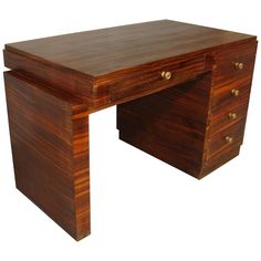 a wooden desk with two drawers on each side and one drawer at the top that is open