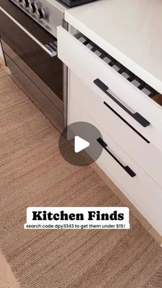 a kitchen with an oven, stove and counter top that has the words kitchen finds written on it