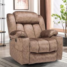 a brown reclining chair sitting on top of a rug