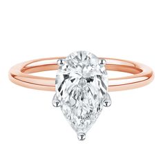 a rose gold engagement ring with an oval cut diamond