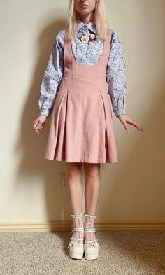 "Soft wool makes this suspender skirt a perfect winter piece. Fully lined (so you can wear with tights side zip, and buttoned straps. Back detail features gold oversized safety pins on the strap closure.  Flat measurements  Waist 13\" Overall length from shoulder 35\" Skirt length from waist 19\"" Childish Outfits For Women, Fitted Fall Pinafore Dress With Pockets, Fitted Knee-length Pinafore Dress For Fall, Knee-length Fitted Pinafore Dress For Fall, Fitted Pinafore Dress With Adjustable Straps, Overalls Skirt Outfit, Skirt Overalls Outfit, Childish Clothes, 2010s Twee