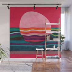 an abstract painting on the wall with pink, green and blue stripes in front of it