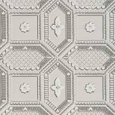 an old fashioned wallpaper pattern with white and gray designs on the ceiling, in shades of grey