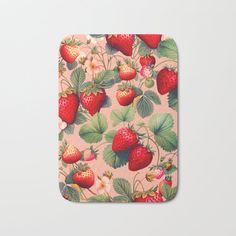 strawberries and leaves on pink background bath mat