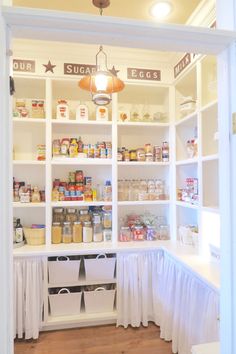 an open pantry with lots of food in it