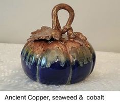 an ancient copper, seaweed and cobalt glass pumpkin