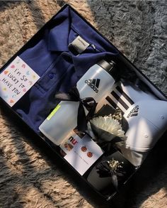 an open suitcase with personal items in it