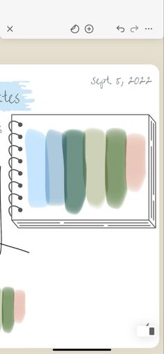 an open notebook with pastel swatches on it