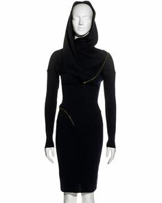 Azzedine Alaia navy knitted virgin wool bodycon hooded dress, fw 1986 For Sale at 1stDibs | alaia hooded dress, alaia hood dress, hooded evening gown Hooded Fitted Winter Dress, Dress Fw, Hood Dress, Slim Aarons, Azzedine Alaia, Hooded Dress, Gianni Versace, Wool Dress, Historical Fashion