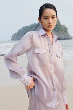 Crafted with high-quality organza fabric, this shirt boasts a straight cuff sleeve design for a sophisticated look. Perfect for both casual and formal occasions, this shirt is a must-have for those who value both style and comfort. Length:- Overall: 70cm- Sleeve length: 63cm Elegant Long Sleeve Blouse With Set-in Sleeves, Chic Formal Blouse With Set-in Sleeves, Elegant Summer Blouse With Set-in Sleeves, Chic Silk Shirt For Semi-formal Occasions, Chic Semi-formal Silk Shirt, Silk Blouse With Sheer Sleeves For Work, Chic Formal Top With Set-in Sleeves, Luxury Button-up Blouse For Spring, Silk Shirt For Office Wear