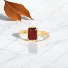 Bezel Set Garnet Solitaire Ring 18k Solid Gold Simple Jewelry Emerald Cut Red Gemstone Anniversary Ring Personalized Birthday Gift For Women Main Stone: Garnet (Lab Created) Main Stone Size: 8x6 mm Main Stone Color: Red Main Stone Shape: Emerald Cut Birthstone: January Jewelry Type: Engagement Ring Metal: 925 Sterling Silver Method: Cast Personalization: Possible Occasion: Engagement Style: Heart Cut Ring Size: We make rings from US 4 to US 10. (If you need smaller or bigger ring size, please ask me to resize) SKU: RI-162 Country of Manufacture: India Customization / Replacements:- For custom making jewelry, it can be made in 2 different metal. 1. Solid gold, including 14/18k white/yellow gold. 2. 925 sterling silver with white/yellow gold plated. It's easy to create jewelry that's perfect Gold Simple Jewelry, Jewelry Emerald, Unique Products Design, Birthday Gift For Women, Red Gemstones, Types Of Gemstones, Garnet Stone, Green Peridot, Aquamarine Blue