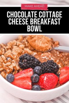 chocolate cottage cheese breakfast bowl with berries and granola in the middle on a striped table cloth