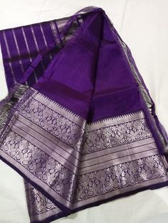 Big kanchi border mangalagiri saree fall & pico done Purple Handloom Pre-draped Saree For Puja, Purple Handloom Pre-draped Saree For Diwali, Purple Handloom Chanderi Pre-draped Saree, Purple Slub Silk Saree For Puja, Tussar Silk Handloom Pre-draped Saree For Puja, Purple Handloom Cotton Silk Saree, Purple Cotton Silk Handloom Saree, Traditional Slub Silk Wear With Border, Purple Banarasi Silk Saree With Border